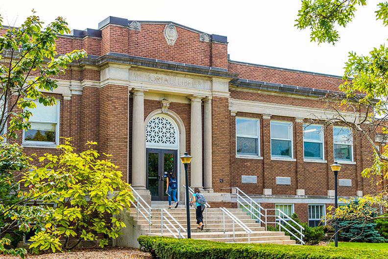 The front of Memorial Hall is shown on the campus of Elmhurst College. The building houses Elmhurst's new Public Health program.